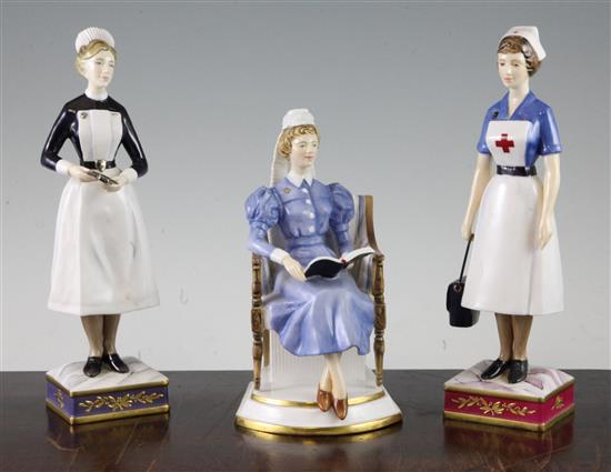 Three Royal Worcester porcelain figures of nurses, 17cm - 22cm, all boxed with certificates